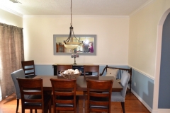 Add a chair rail and a fresh coat of paint to update your dining space